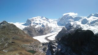 4K Computer Monitor - stunning aerial view of the alps in winter | Trending HD Video