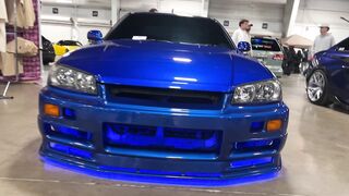 Cartier - vibrant blue car display at indoor auto show | Trending HD Video