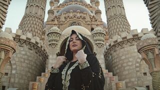 Woman - a woman standing in front of a grand palce | Trending HD Video