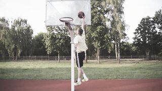Sports - a man dunking a basketball | Trending HD Video