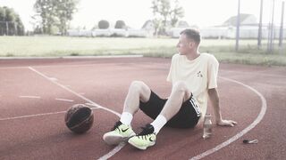 Notes on Being a Man - man sitting on basketball court | Trending HD Video