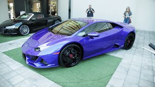 Scarred - a luxurious sports car on display in a car show | Trending HD Video