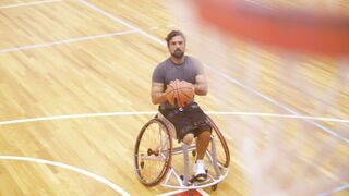Sportsgirl - a man shooting a basketball while on a wheelchair | Trending HD Video