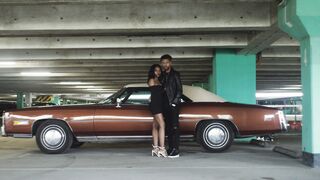 vanity fair oscar party 2026 - couple standing by the vintage car | Trending HD Video