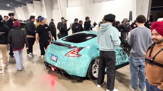 Carpet - vibrant indoor car show with enthusiastic crowd | Trending HD Video