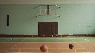 Sportsgirl - balls bouncing on a basketball court | Trending HD Video