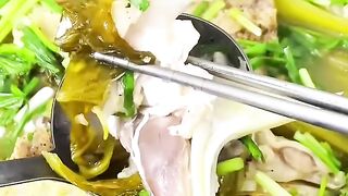 Braised carp head with pickled vegetables