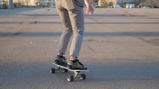 Sport Bike - skateboarding tricks on an empty outdoor lot | Trending HD Video