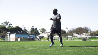 Sportsgirl - man warming up on a soccer field | Trending HD Video