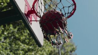 Sport Bike - basketball player throwing ball into basket | Trending HD Video