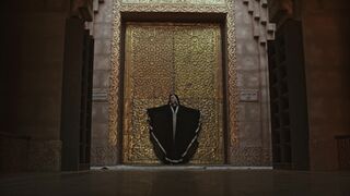 The Shy Snow Woman and the Cursed Ring - a woman standing in front of a bronze door | Trending