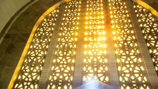 the rays of the sun through the gaps of a wall | Professional HD Video