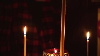 Woman - woman contemplating on a candlelight room | Trending HD Video