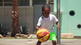 Sports - little boy dribbling a ball | Trending HD Video