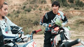 Sportsgirl - motorcyclists talking in the outdoors | Trending HD Video