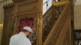 Notes on Being a Man - a man going up the stairs while wearing a thobe | Trending HD Video