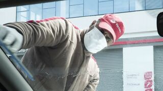 oscars academy awards - a service station attendant cleaning a car windshield | Trending HD Vid