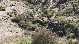 Travelon - person sitting on a cliff | Trending HD Video