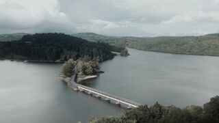 4K Computer Monitor - aerial view of serene bridge over lake in nature | Trending HD Video