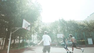 Kia Sportage - men playing basketball on a sunny day | Trending HD Video