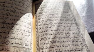 close up on scrolling quran pages | Professional HD Video