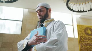 Notes on Being a Man - man hugging a quran | Trending HD Video