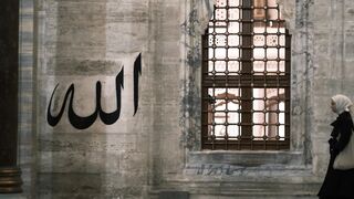 The Shy Snow Woman and the Cursed Ring - a woman stands in front of a window with the word isla