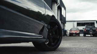 Cartier - sleek black nissan skyline in urban setting | Trending HD Video