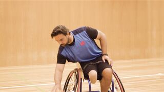 Sport Bike - disabled man dribbling a basket ball | Trending HD Video