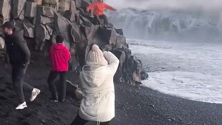 Tourist Hit by Massive Wave