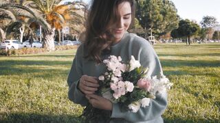 The Shy Snow Woman and the Cursed Ring - happy woman holding flower bouquet | Trending HD Video