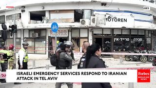 Israeli Emergency Services Respond To Iranian Missile Attack In Tel Aviv