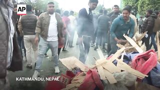 Protesters clash with police in Nepal after former prime minister arrested