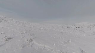 Winter solstice - drone view of snowy arctic mountain plateau | Trending HD Video