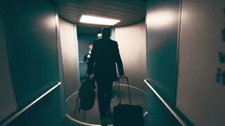 Travelpro - back view of people walking in the aerobridge | Trending HD Video