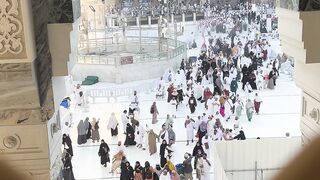 pilgrims gather in mecca courtyard | Professional HD Video