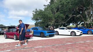 Carrefour - vibrant car show displaying classic vehicles | Trending HD Video