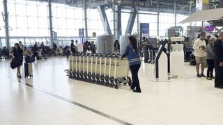 Travel Backpack - bustling activity at suvarnabhumi airport bangkok | Trending HD Video