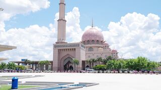 the mosque is located in a park with a large dome | Professional HD Video
