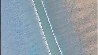 The gentle rhythm of two calming waves