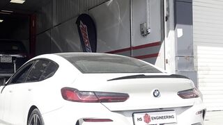 Electric car - luxury white coupe entering auto repair shop | Trending HD Video