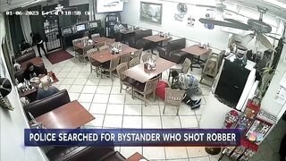 Customer shoots and kills armed robber in Houston taco shop.