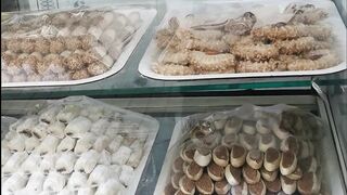 Various sweets and fresh fruit juices on the streets of the old town in Rabat, Morocco.