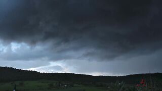 Dark Rain Clouds Over Quiet Countryside | Free Rain Footage for Download (4K Nature Ambience)