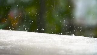 Free Rain Footage 4K – Slow Motion Raindrops Splashing on Surface | Relaxing Nature Background