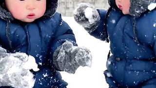 cute babies on snow garden 2