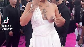 Tokischa hanging Bo ob with Sword in Nipple