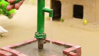 Peanut Village's Water Supply Mission  Mini water pump's on!
