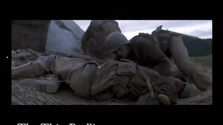 Soldiers going up the hill under fire