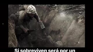 Soldiers fighting in open field under heavy fire